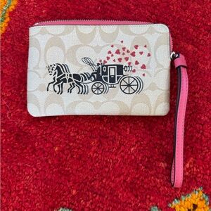 Coach Classic Cream Wristlet with Carriage Logo and Heart Detail